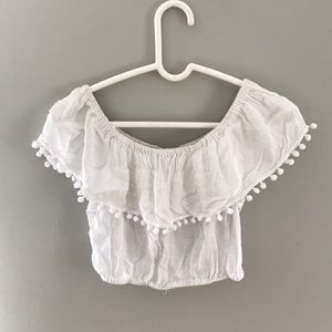 White off the shoulder pom pom top